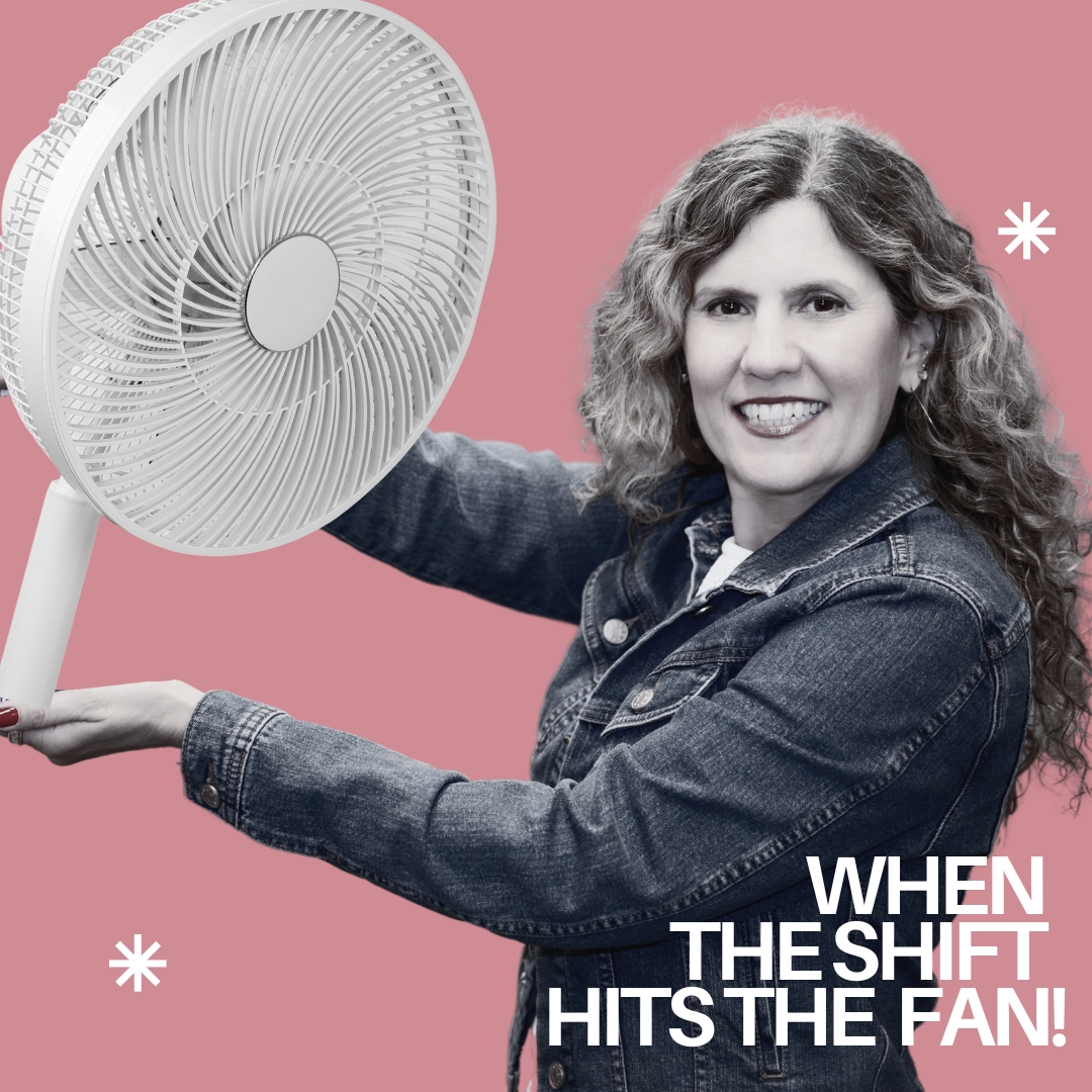 Woman holding fan 